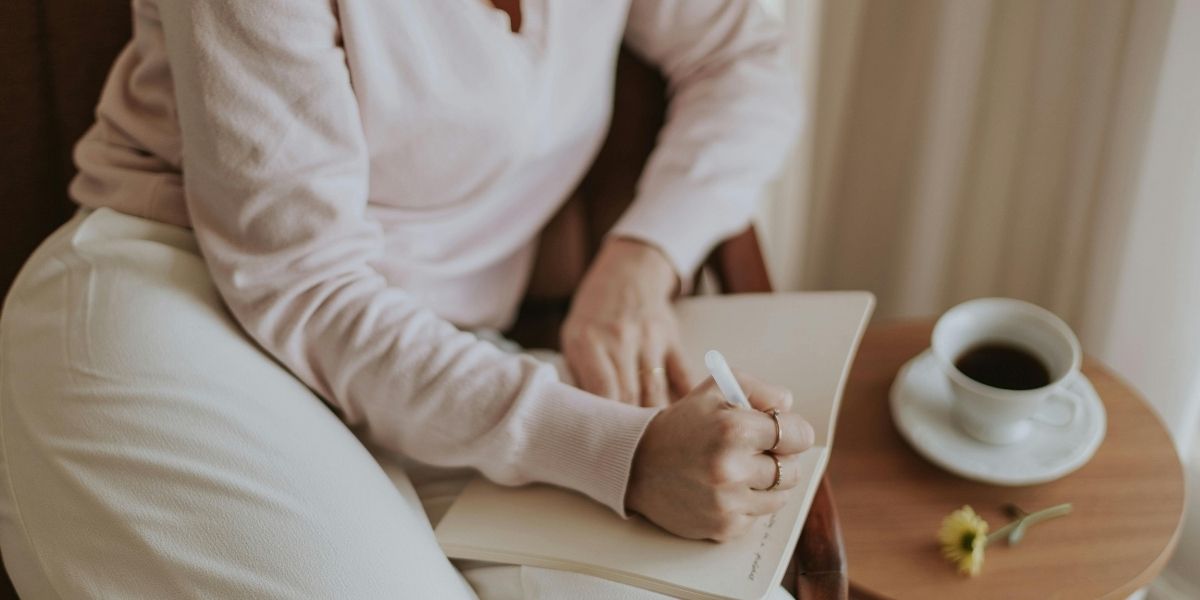 woman writing her routine